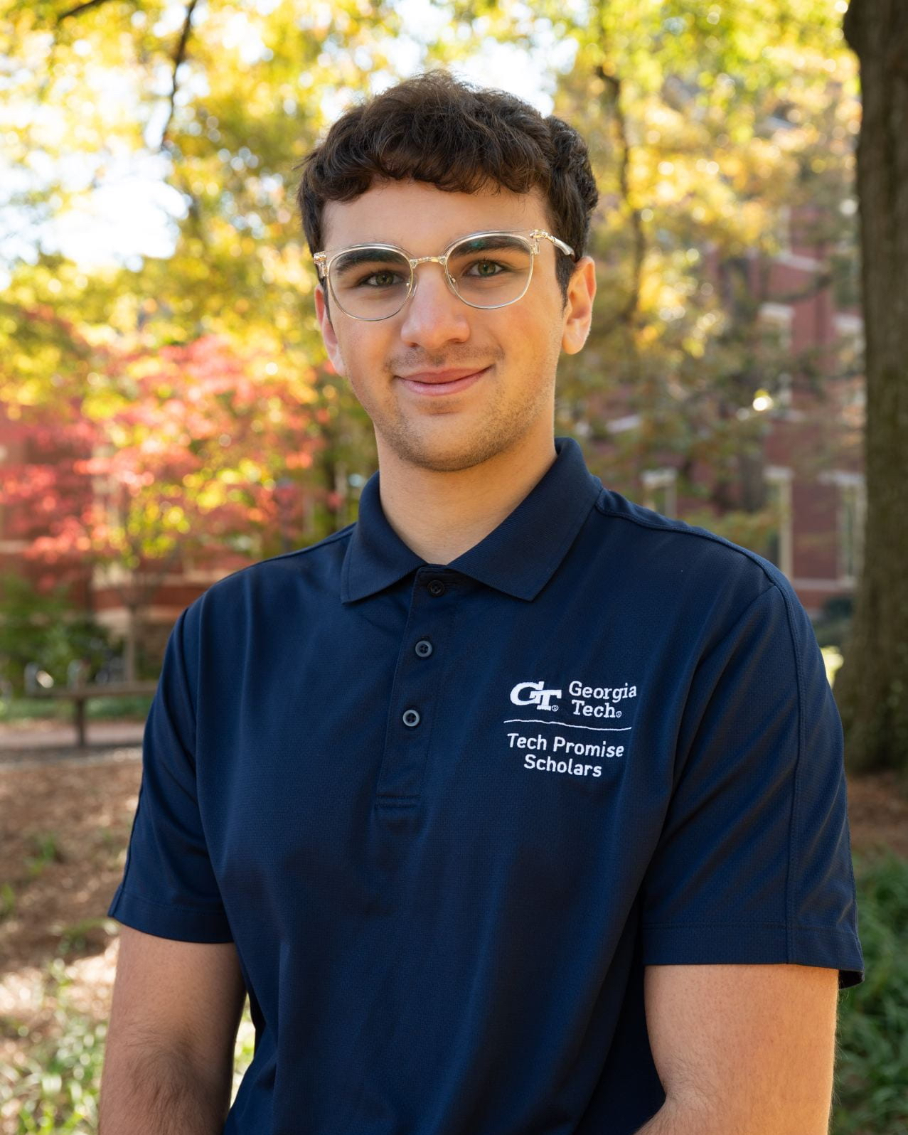 Nick Fabrizio wearing a blue Tech Promise shirt