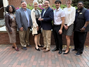 Leslie Roberts, David Gaston, Susan Lozier, Marc Sprouse, Arya Akbarshahi, Andrea Comsa, and James Stringfellow 7 people standing in a line